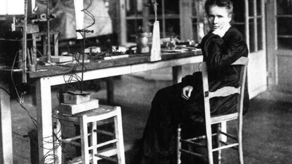 Marie Curie in her lab, black and white old photograph.
