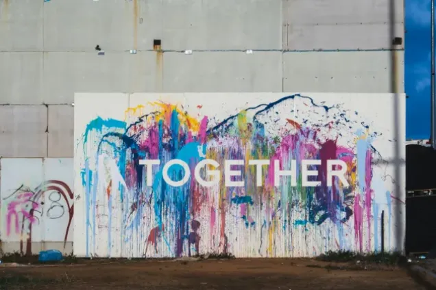 målning med text "together"